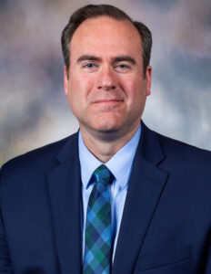 Dr. Christopher Maynard