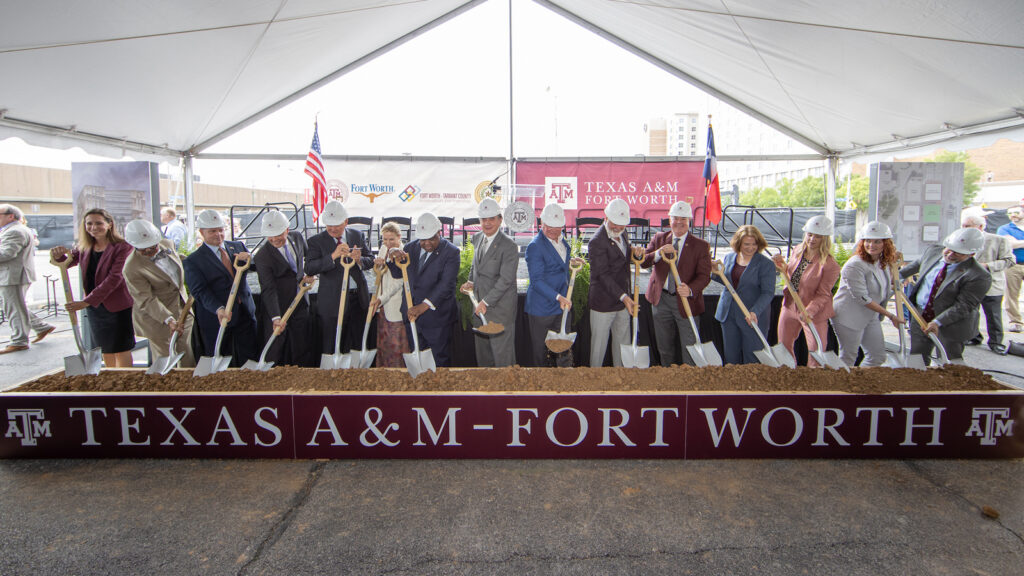 A group of people take part in the groundbreaking for Texas A&M-Fort Worth