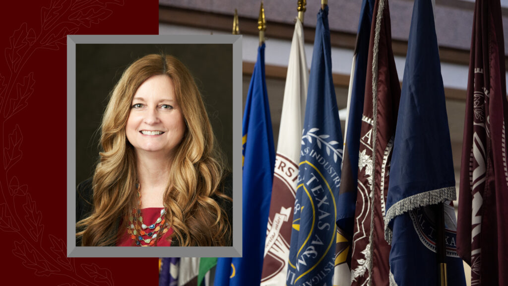 Portrait of Teresa Edwards with Texas A&M System member institution flags in the background.